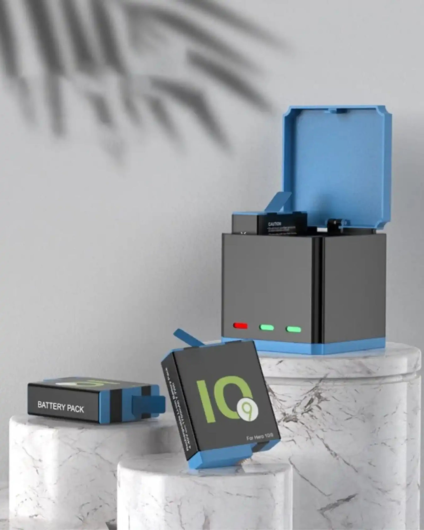 A black and blue battery charging station with two battery packs.